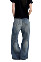 Ripped Whisker Jeans