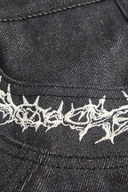 Embroidered Flared Raw Jeans