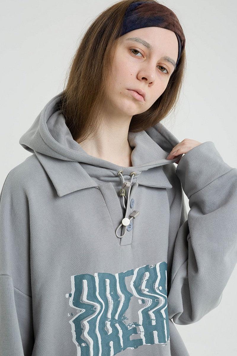 Center of Rotation Stitched Polo Hoodie